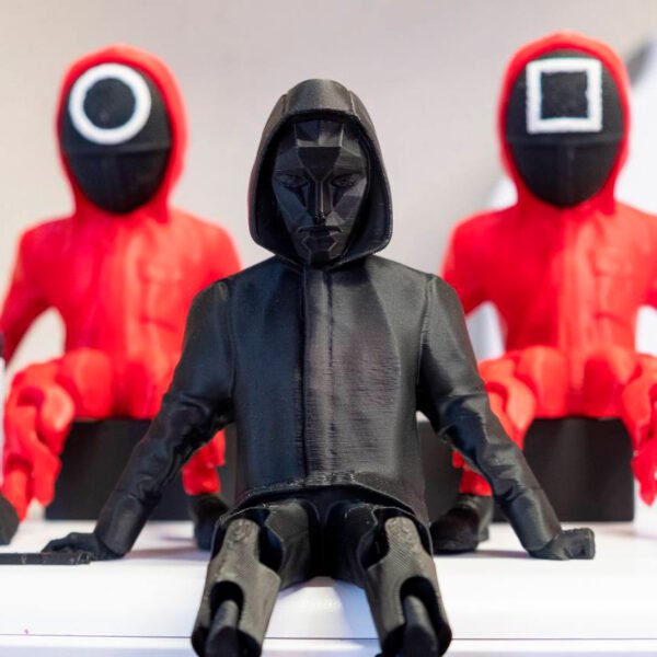 Seated Black Mask Figure (Front Man) from the "Squid Game" Series - Image 2