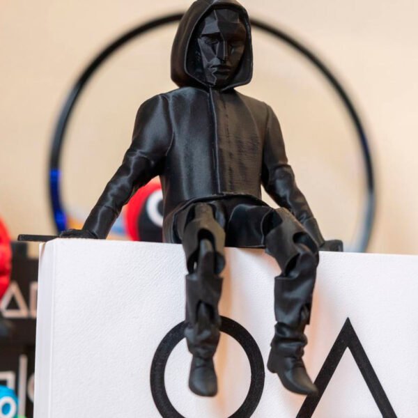 Seated Black Mask Figure (Front Man) from the "Squid Game" Series - Image 4
