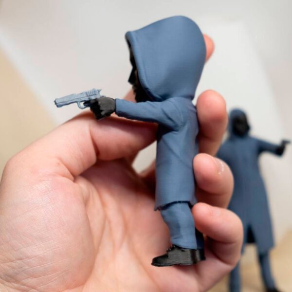 Black Mask Figure (Front Man) with Gun from the "Squid Game" Series - Image 4